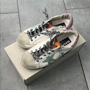 Superstar Sneakers with Green and Pink Accents